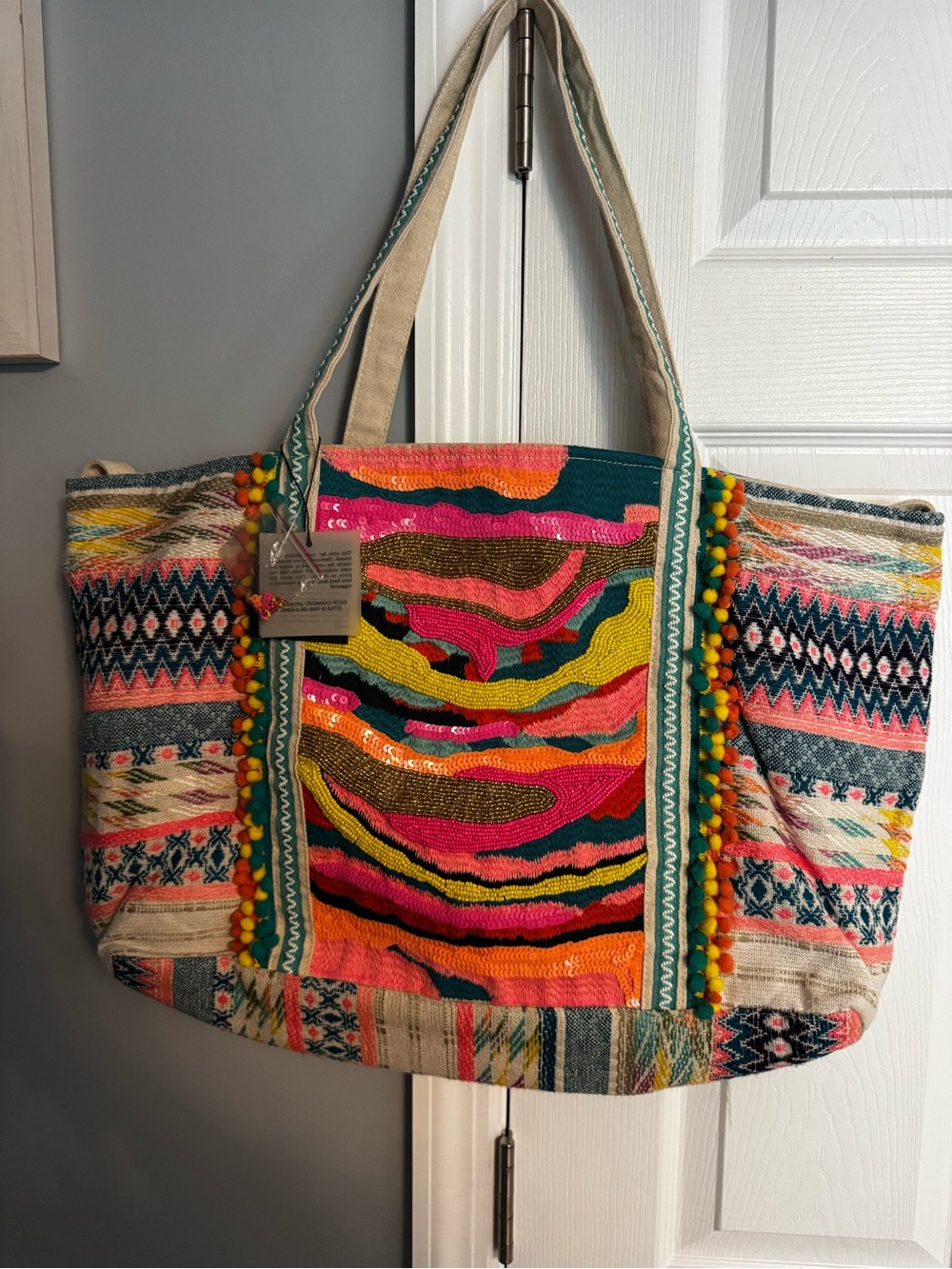 America and beyond Daphne embellished tote. NWT